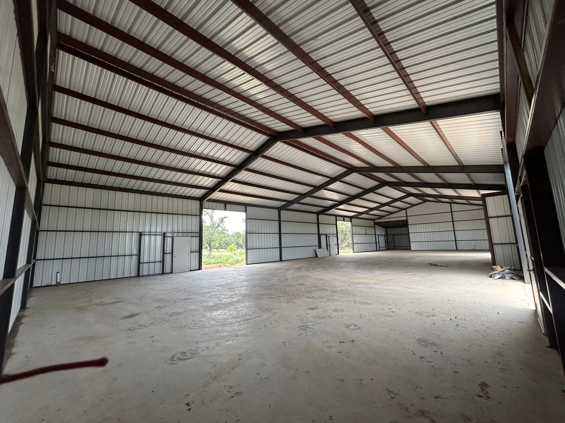 Clear-span interior with no centre posts — custom metal buildings by RMB in interior