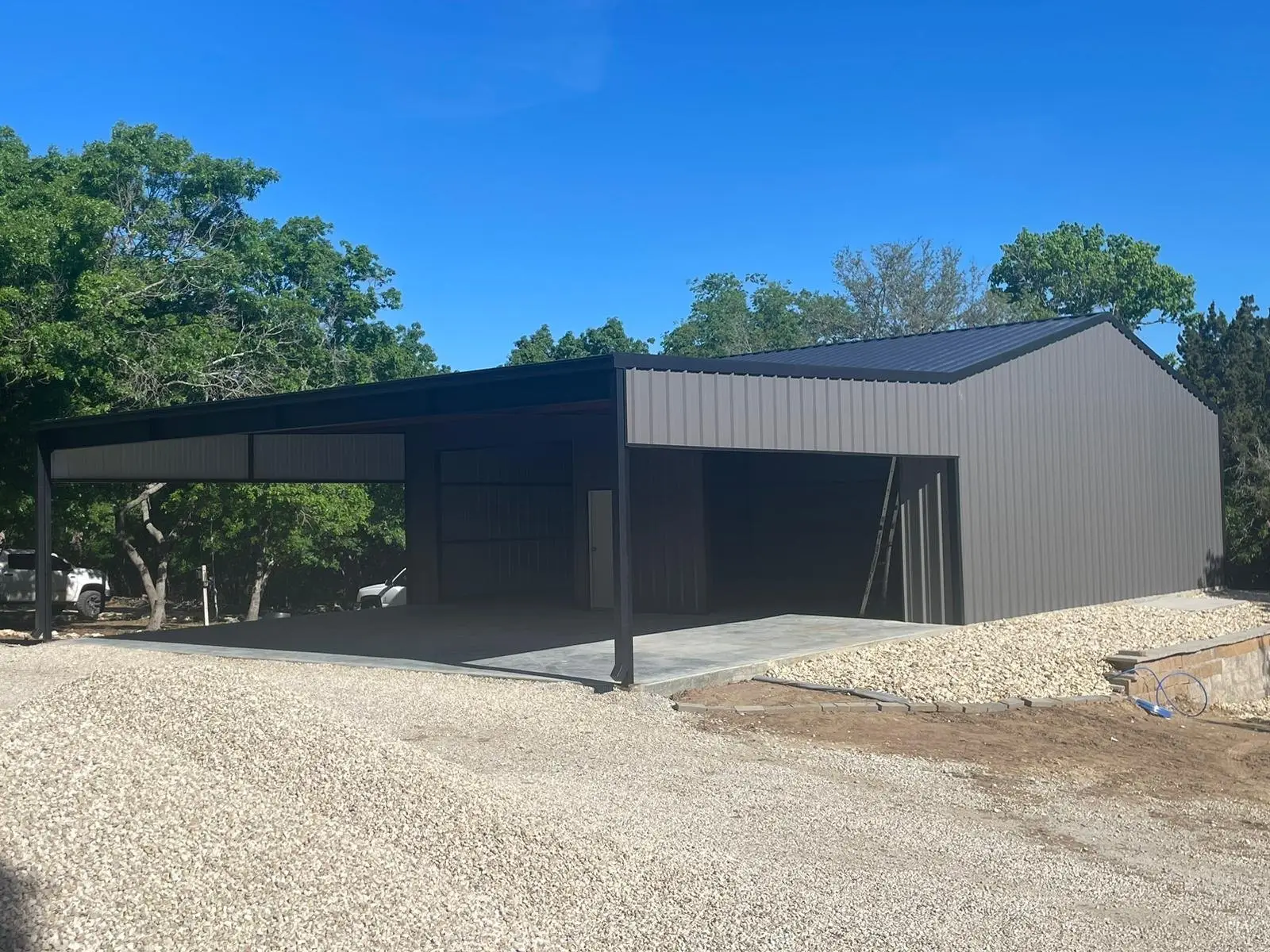 Charcoal shop with an open lean-to — built by Rodriguez Metal Buildings, McLennan County